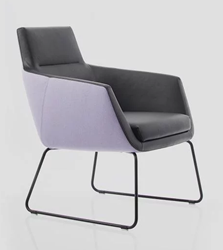 Köhl Artiso lounge fauteuil op sledeframe materiaalmix stof en leder 